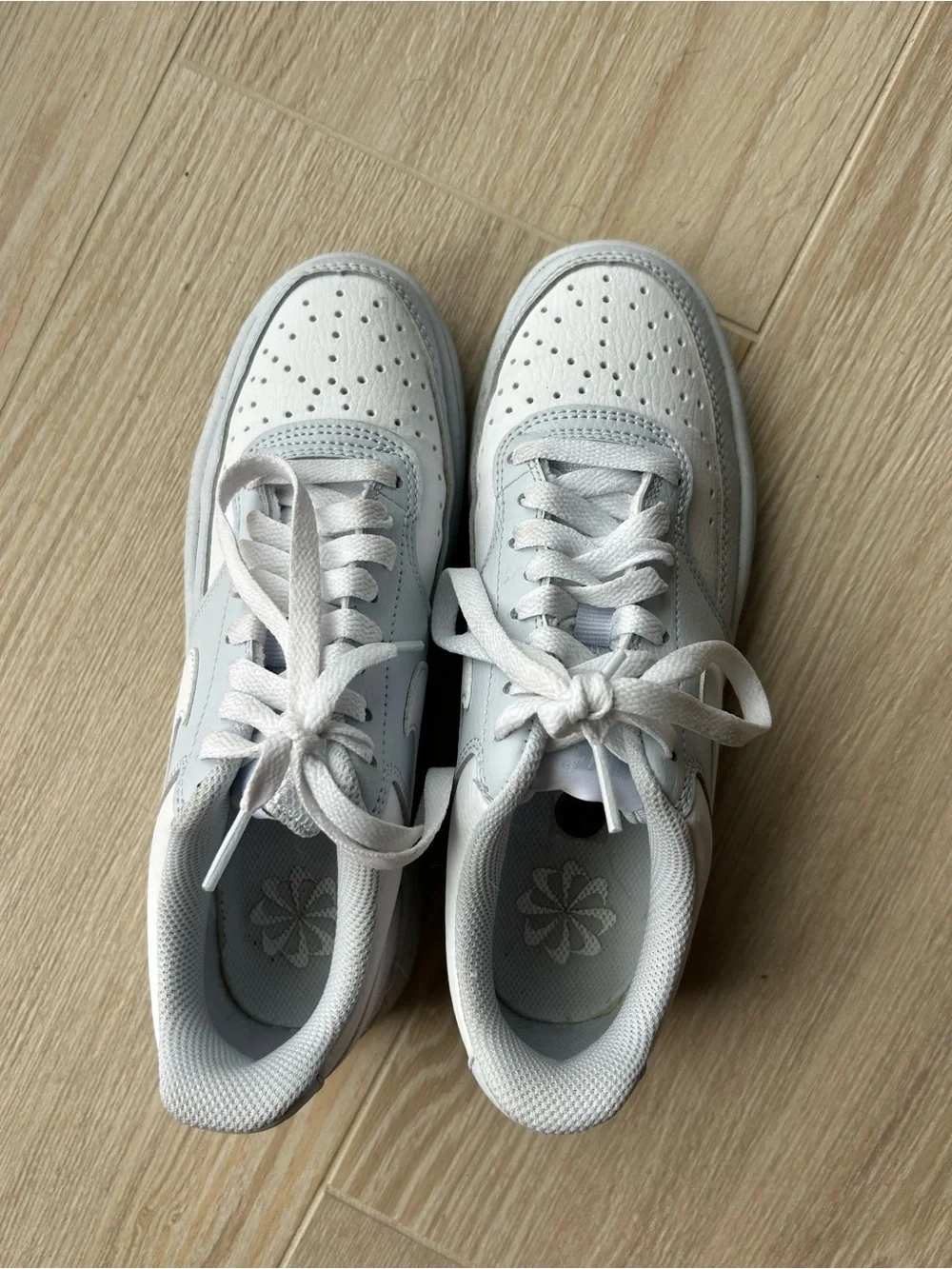 Nike White Low-Top Leather Sneakers with Subtle Gray Accents